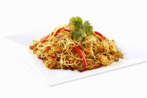 Singapore noodles with peppers — Stock Photo