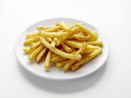 Plate of potato fries — Stock Photo