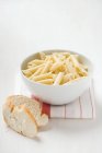 Penne pasta in bowl — Stock Photo