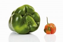 Green pepper and habanero chilli — Stock Photo