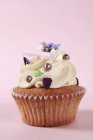 Vanilla cupcake with sugar balls — Stock Photo