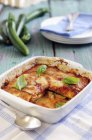 Courgette parmigiana with pasta top — Stock Photo