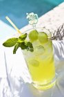 Closeup view of melon cocktail with mint leaves — Stock Photo