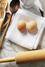 Brown Eggs on white napkin — Stock Photo