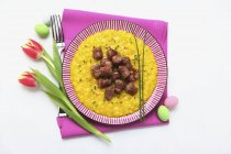 Saffran risotto rice with salsiccia — Stock Photo