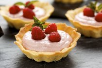 Small raspberry tarts — Stock Photo
