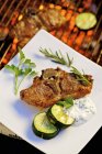 Barbecued lamb chop with cucumber — Stock Photo