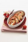Oven-baked king prawns with tomatoes — Stock Photo