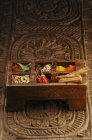 Elevated view of assorted spices in Indian wooden box — Stock Photo