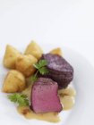 Medallions of venison with croquettes — Stock Photo