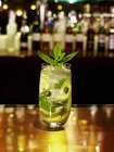 Cold Mojito on a bar stand — Stock Photo