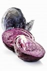 Whole and halved red cabbages — Stock Photo