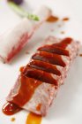 Closeup view of snow beef with sauce — Stock Photo