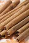 Cinnamon sticks on napkin — Stock Photo