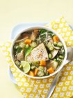 Vegetable soup with grilled fish — Stock Photo