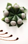 Glutinous rice balls in leaves — Stock Photo