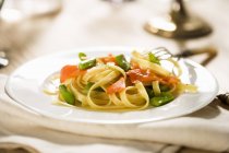Salmon and asparagus pasta — Stock Photo