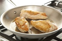 Browning Chicken Breasts — Stock Photo