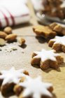 Cinnamon stars and almonds — Stock Photo