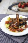 Lamp chops with tomatoes — Stock Photo