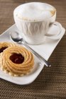 Cappuccino and hazelnut tarts — Stock Photo