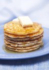 Pancakes with maple syrup and butter — Stock Photo