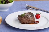 Fried fillet steak on plate — Stock Photo