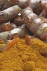Turmeric roots and powder — Stock Photo