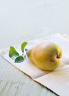 Fresh pear with leaves — Stock Photo