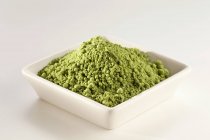 Japanese Matcha green tea powder in a white dish — Stock Photo