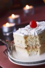 Tres Leches Cake with Cinnamon and Cherry — Stock Photo