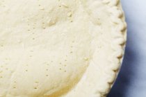 Closeup view of pie crust with poked fork holes — Stock Photo