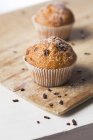 Muffins with sugar and chocolate — Stock Photo