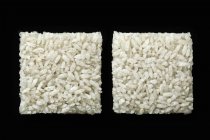 Squared heaps of rice — Stock Photo