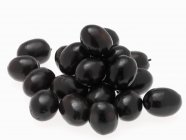 Un mucchio di olive nere — Foto stock