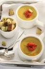 Butternut squash soup with pured peppers — Stock Photo