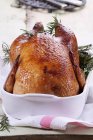 Whole Roasted chicken with rosemary — Stock Photo