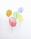 Closeup view of homemade colored lollies on white background — Stock Photo