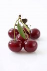 Red cherries with leaves — Stock Photo
