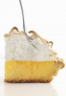 Lemon meringue pie with a fork — Stock Photo