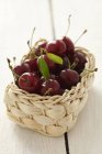 Red cherries with leaves — Stock Photo