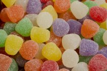 Крупним планом вид барвистих крапель спеції в цукрі — стокове фото