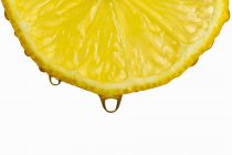 Капає лимона скибочка — стокове фото