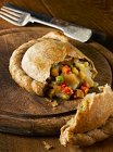 Wholemeal vegetable pasty, cut — Stock Photo