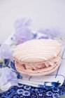 Pink macaroon filled with buttercream — Stock Photo