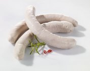 Raw white sausages — Stock Photo