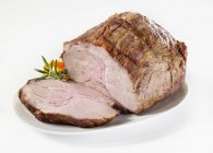 Partly sliced Roasted pork neck — Stock Photo