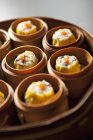 Closeup view of Chinese steamed buns in steamers — Stock Photo