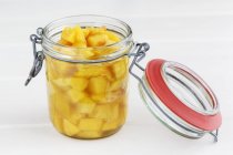 Peach compote in jar — Stock Photo