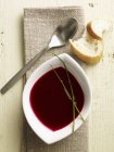 Cream of beetroot soup with bread — Stock Photo